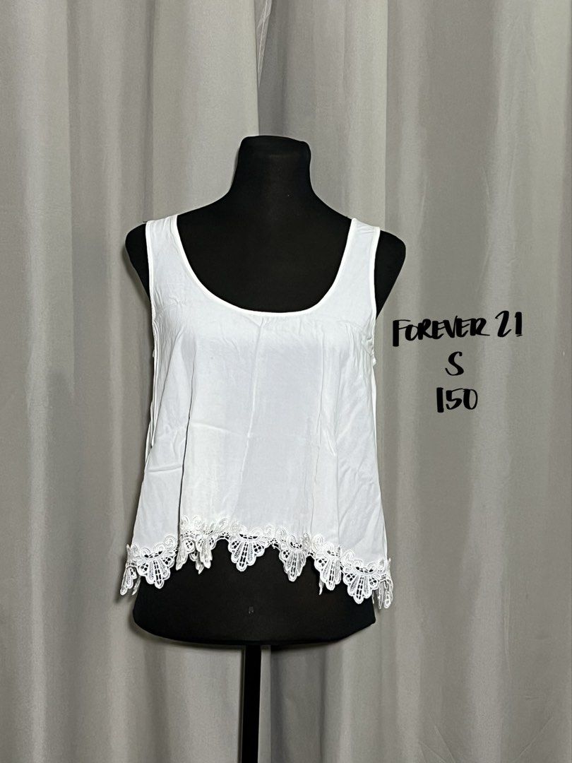 Forever 21 white sleeveless top (Category: Sleeveless) located in Las Pinas. Submitted by jilanah (Listing ID 1467564398, Image 1). Description: .