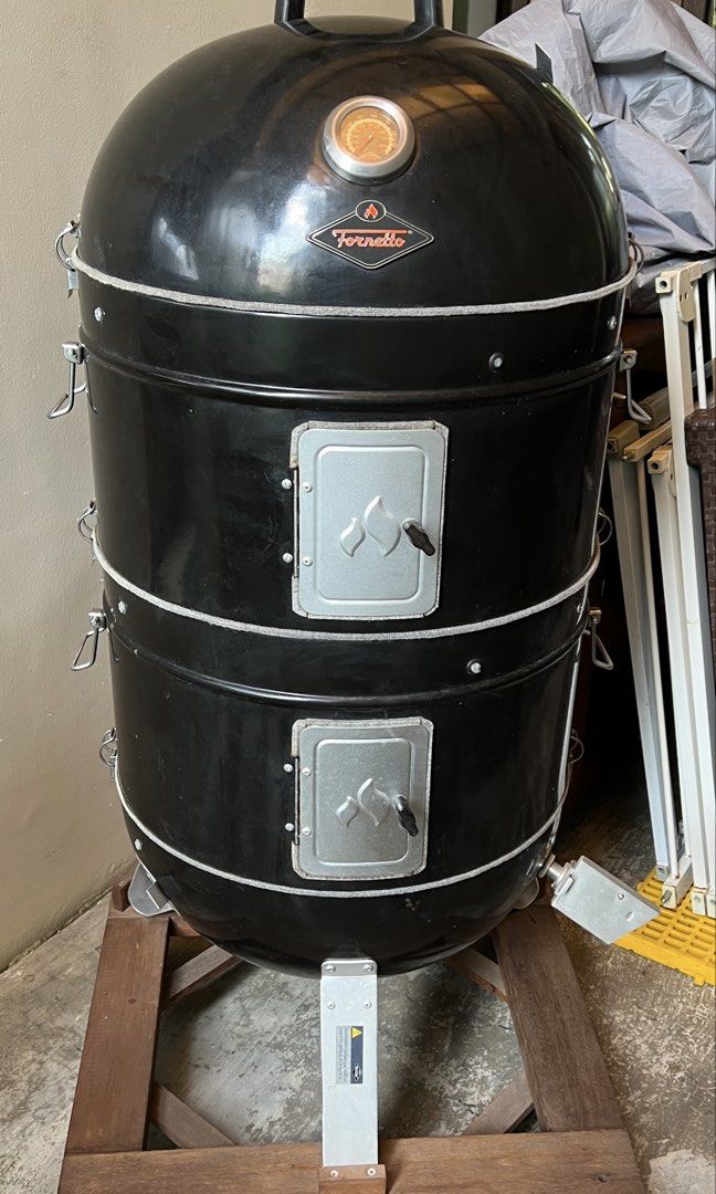 Fornetto Basso 22” Vertical Bullet Smoker (Category: BBQ, Grills & Hotpots) located in Mandaluyong City. Submitted by maropa (Listing ID 1467273170, Image 1). Description: - Sleek black Fornetto smoker grill, perfect for backyard BBQ and smoking - Price is negotiable. Make a reasonable offer if interested. - Multi-tier setup with a built-in lid thermometer for precise temperature control - Two side access doors featuring secure latches for easy f