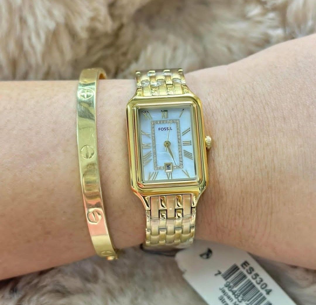 Fossil ES5304 Gold Rectangular Watch (Category: Women's Watches) located in Cebu City. Submitted by genzshoppe26984 (Listing ID 1467462090, Image 1). Description: - Brand: Fossil - Model: ES5304 - Condition: Brand new, never worn with original store tag attached - Case & Strap: Gold-tone rectangular case and linked bracelet with protective plastic wrap still intact - Dial: Elegant white dial with classic Roman numerals and sparkling crystal accen