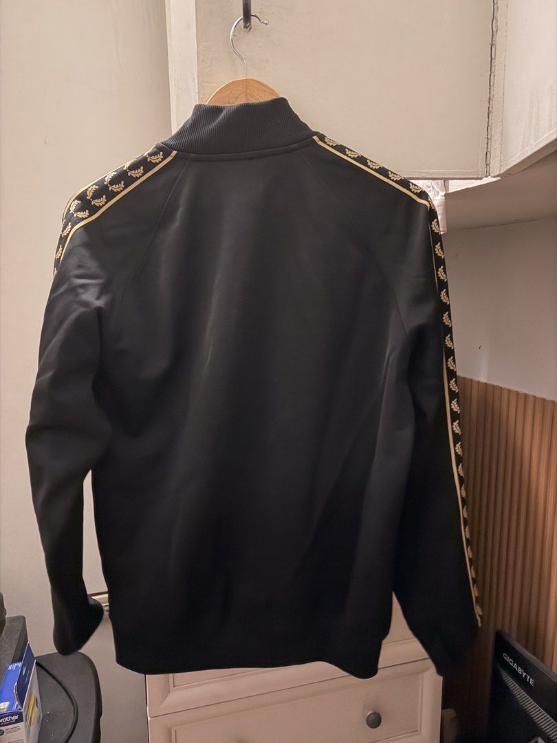Fred Perry Branded Tape Zip Sweatshirt (Category: Coats, Jackets and Outerwear) located in Caloocan City. Submitted by almrjsry24124 (Listing ID 1467400275, Image 2). Description: Original po? Opo .