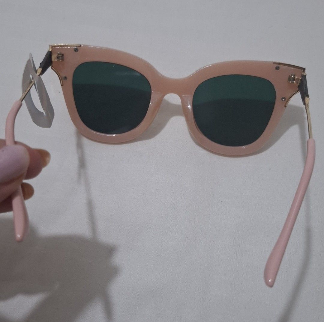 Free sunglasses pink (Category: Sunglasses & Eyewear) located in Taguig. Submitted by welcome2myprelovedshop (Listing ID 1467457979, Image 2). Description: take this for free when u buy anything from my listing. never used this just stored it. its free cause the lether part of the shades is peeling but not so noticeable (can be peeled off) bought from Thailand. check last photo.