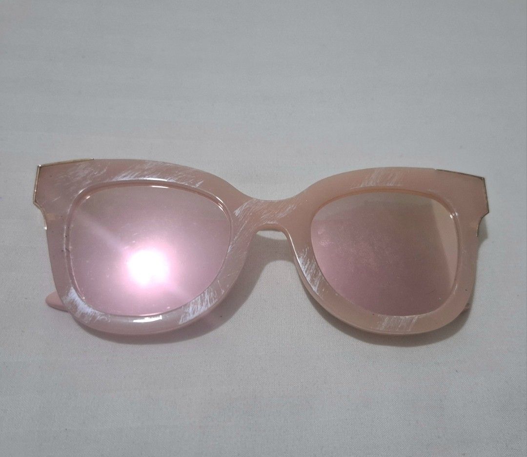 Free sunglasses pink (Category: Sunglasses & Eyewear) located in Taguig. Submitted by welcome2myprelovedshop (Listing ID 1467457979, Image 1). Description: take this for free when u buy anything from my listing. never used this just stored it. its free cause the lether part of the shades is peeling but not so noticeable (can be peeled off) bought from Thailand. check last photo.