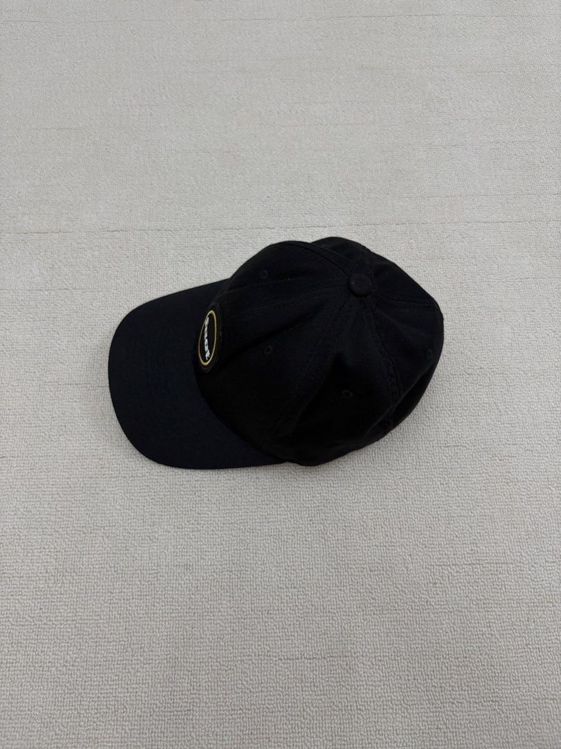 FUCT Patch Flexfit Cap (Category: Caps & Hats) located in Manila. Submitted by porma.market (Listing ID 1467403999, Image 3). Description: - Brand: FUCT (EST 1991 Los Angeles CA) - Color: Black with white and yellow embroidered logo patch - Material: 80% acrylic, 20% wool blend - Fit: Original Flexfit elastic band for comfortable wear - Design: Classic curved brim with stylish grey underbrim - Condition: Clean structure all around, ready to wear.