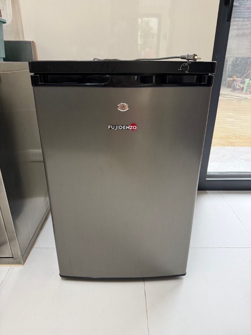 Fujidenzo Upright Freezer UF-35S2 (Category: Refrigerators and Freezers) located in Quezon City. Submitted by csdav (Listing ID 1467424956, Image 1). Description: - Brand/Model: Fujidenzo Upright Freezer UF-35S2 - Finish: Sleek silver with black top - Storage: 4 clear pull-out drawers plus wire shelves for organized freezing - Condition: Clean interior, works great - Size: Compact design, ideal for small spaces - Inclusions: Power plug included.