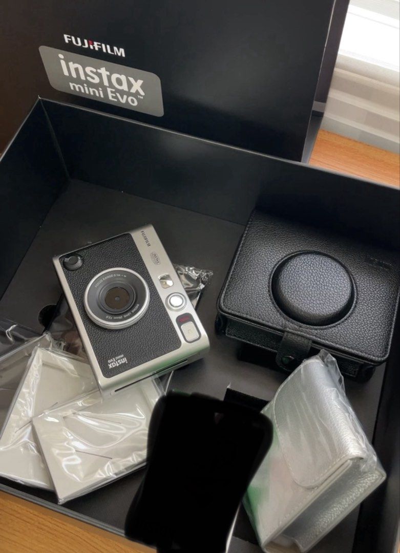 Fujifilm Instax Mini Evo Leather Kit Limited Edition (Category: Cameras) located in Caloocan City. Submitted by ginnypygmypuff (Listing ID 1467409915, Image 3). Description: Negotiable RFS: Need funds for health reasons; barely used no film included Purchase date: Feb 2026 from 14999 Limited Edition Fujifilm Instax Mini Evo Leather Kit box set Includes matching black leather camera case and silver pouch case With SD card Comes with film frames, n