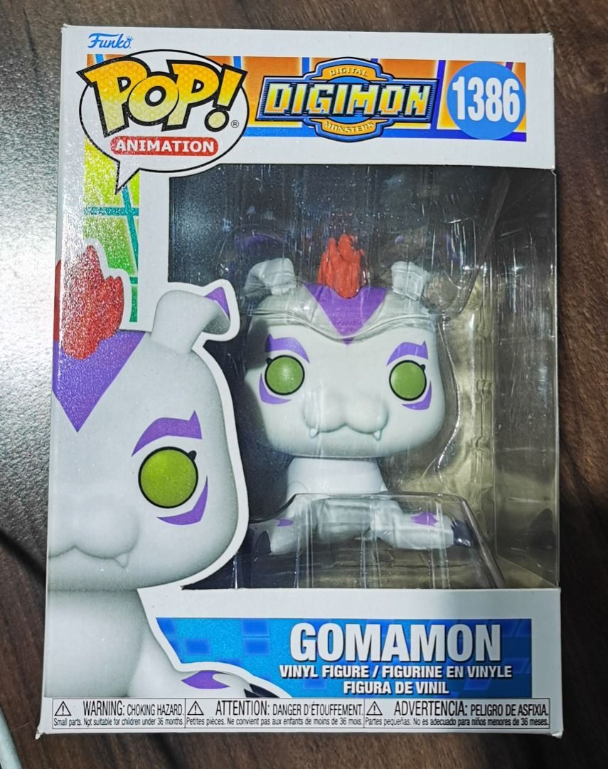 Funko Pop Animation Digimon Gomamon 1386 Vinyl Figure (Category: Designer & Blind Box Toys) located in Quezon City. Submitted by iyanthology (Listing ID 1467472677, Image 1). Description: - Character: Gomamon from Digimon - Funko Pop! Animation Number: 1386 - Design: White body with purple markings and signature orange tuft of hair - Condition: like new, comes in original window box packaging with front artwork - Ideal for: Digimon collectors, an