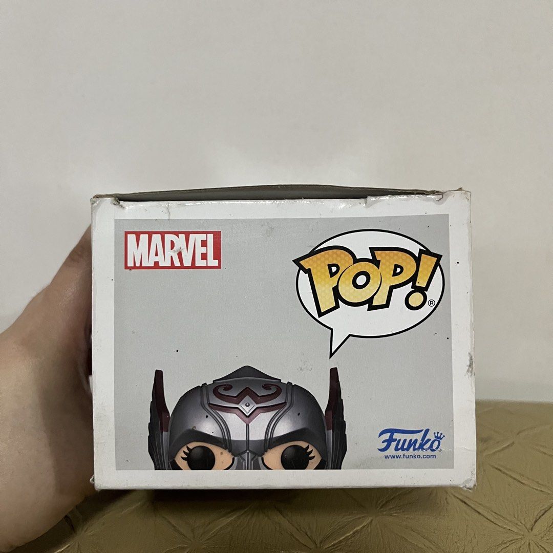 Funko Pop Marvel Studios Thor Love and Thunder Mighty Thor 1046 (Category: Designer & Blind Box Toys) located in San Pedro. Submitted by rainyydayy (Listing ID 1467550282, Image 2). Description: - Item: Marvel Studios Thor: Love and Thunder Mighty Thor Vinyl Figure (#1046) - Edition: Pop In A Box Exclusive with Glow In The Dark feature sticker - Type: Standard bobble-head collectible - Packaging: Original box included (note: some shelf wear on ed