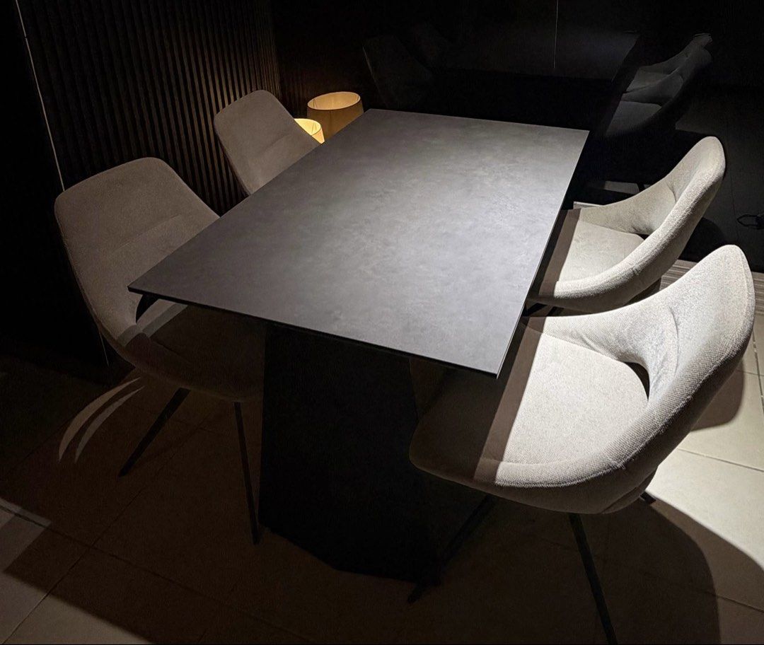 Furniture Republic Dining Set Premium Quality (Category: Tables & Sets) located in Manila. Submitted by iammaleficent18 (Listing ID 1467510282, Image 2). Description: - Dark grey sintered stone top dining table with sturdy black metal legs - Includes 4 dining chairs (One chair has minor defect but the chair is still perfectly usable) - Selling as a complete set only - Self-pickup required due to size -Dining table dimension: 80cm x 120cm Brand: F
