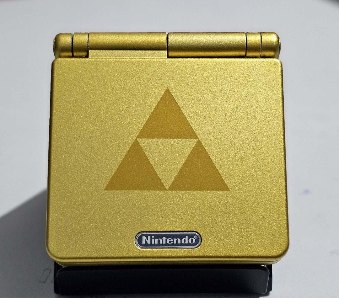 Gameboy Advance SP AGS-101 (Category: Nintendo) located in Santa Rosa. Submitted by j.r.constantino (Listing ID 1467549667, Image 2). Description: 📣 For sale Gameboy Advance SP 📣 🏷️ ₱5,000 ➡️ AGS-101 model ➡️ New Zelda shell ➡️ Bright screen (Orig LCD) ➡️ Loud sounds (newly replaced capacitor) ➡️ All buttons are crisp and working ➡️ EXT and charging port are working ➡️ With new battery and charging cable ➡️ With free games (bootlegs only) ➡️ F