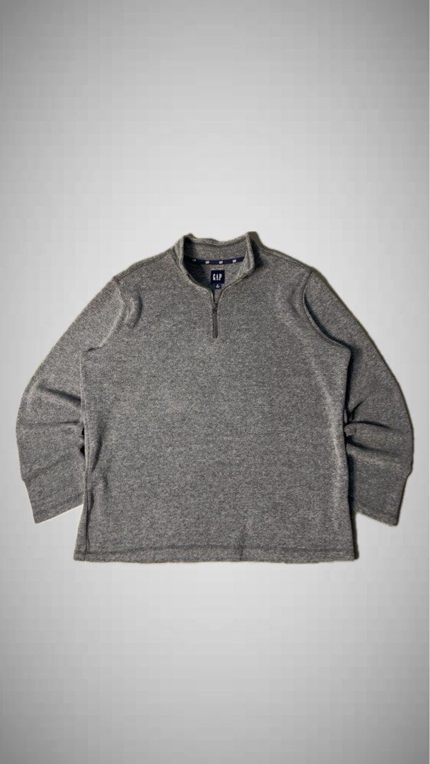 GAP Grey Quarter-Zip Long Sleeve Sweater (Category: Coats, Jackets and Outerwear) located in Manila. Submitted by armamentoj94205 (Listing ID 1467522931, Image 1). Description: - Brand: GAP - Color: Classic Grey (neutral, matches everything) - Style: Quarter-zip pullover with high collar - Fit & Feel: Relaxed fit, long sleeves, soft knit material - Details: Ribbed cuffs and hem, clean inside lining - Condition: Great for layering on cooler days.
