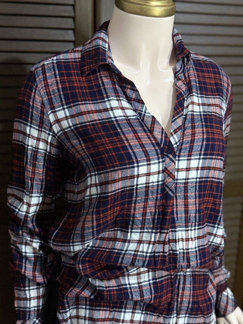 GAP Plaid Long Sleeve Button-Up Blouse (Category: Longsleeves) located in Santiago. Submitted by jy.collection (Listing ID 1467390422, Image 3). Description: - Brand: GAP - Design: Classic red, navy blue, and white plaid - Material: Soft, cozy flannel (great for layering) - Fit: Relaxed fit with V-neck collar, front button placket, and button cuffs - Condition: Excellent pre-loved condition - Mode of Payment: GCash or BPI - Shipping: Via J&T Expr