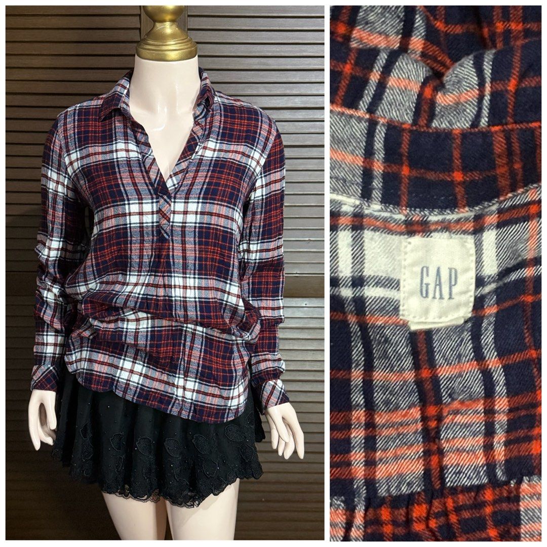 GAP Plaid Long Sleeve Button-Up Blouse (Category: Longsleeves) located in Santiago. Submitted by jy.collection (Listing ID 1467390422, Image 1). Description: - Brand: GAP - Design: Classic red, navy blue, and white plaid - Material: Soft, cozy flannel (great for layering) - Fit: Relaxed fit with V-neck collar, front button placket, and button cuffs - Condition: Excellent pre-loved condition - Mode of Payment: GCash or BPI - Shipping: Via J&T Expr