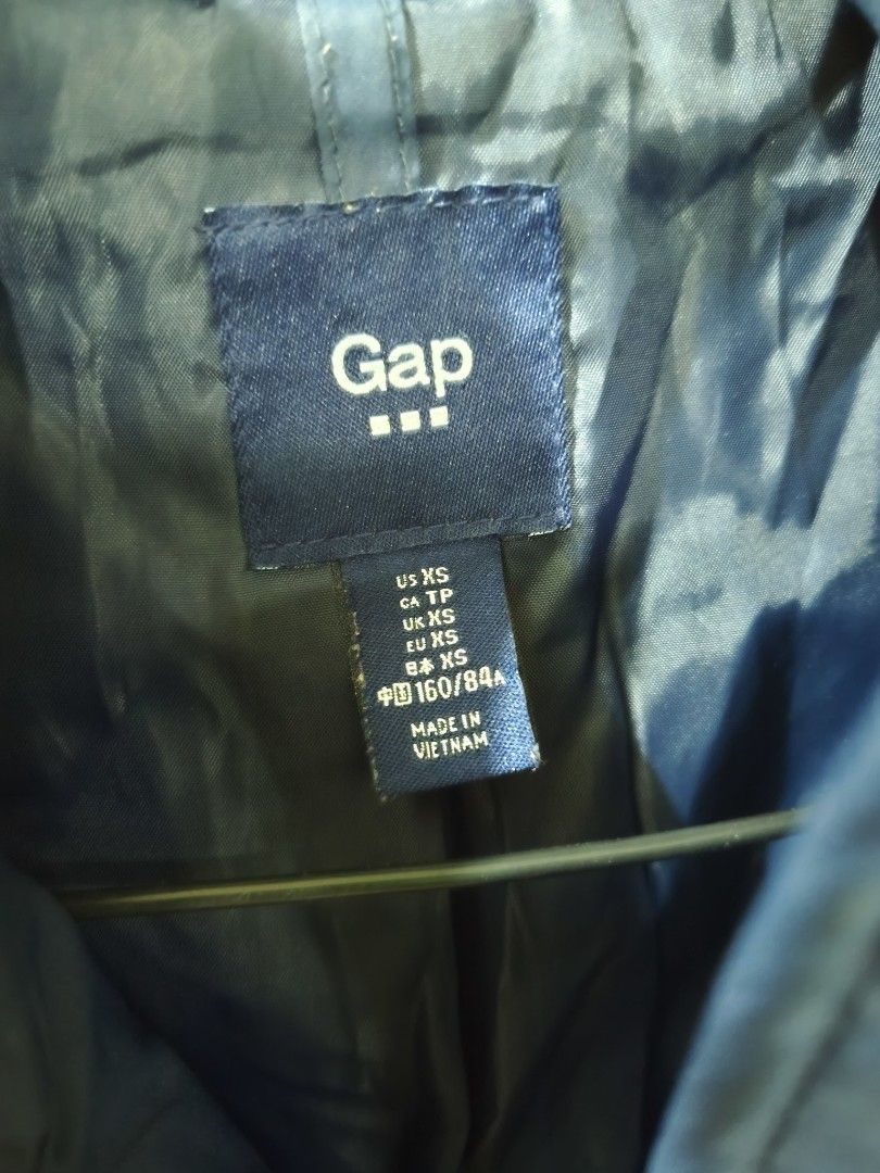 Gap Quilted Navy Blue Winter Jacket Size XS (Category: Coats, Jackets and Outerwear) located in San Juan City. Submitted by vingabby (Listing ID 1467408761, Image 2). Description: - pre love and pre owned from UK - Brand/Model: Gap Quilted Winter Jacket - Color: Navy Blue - Size: US XS (Made in Vietnam) - Design: Classic diamond quilt pattern with a stand-up collar and snap details - Closure: Secure front zipper with snap button overlay - Pockets