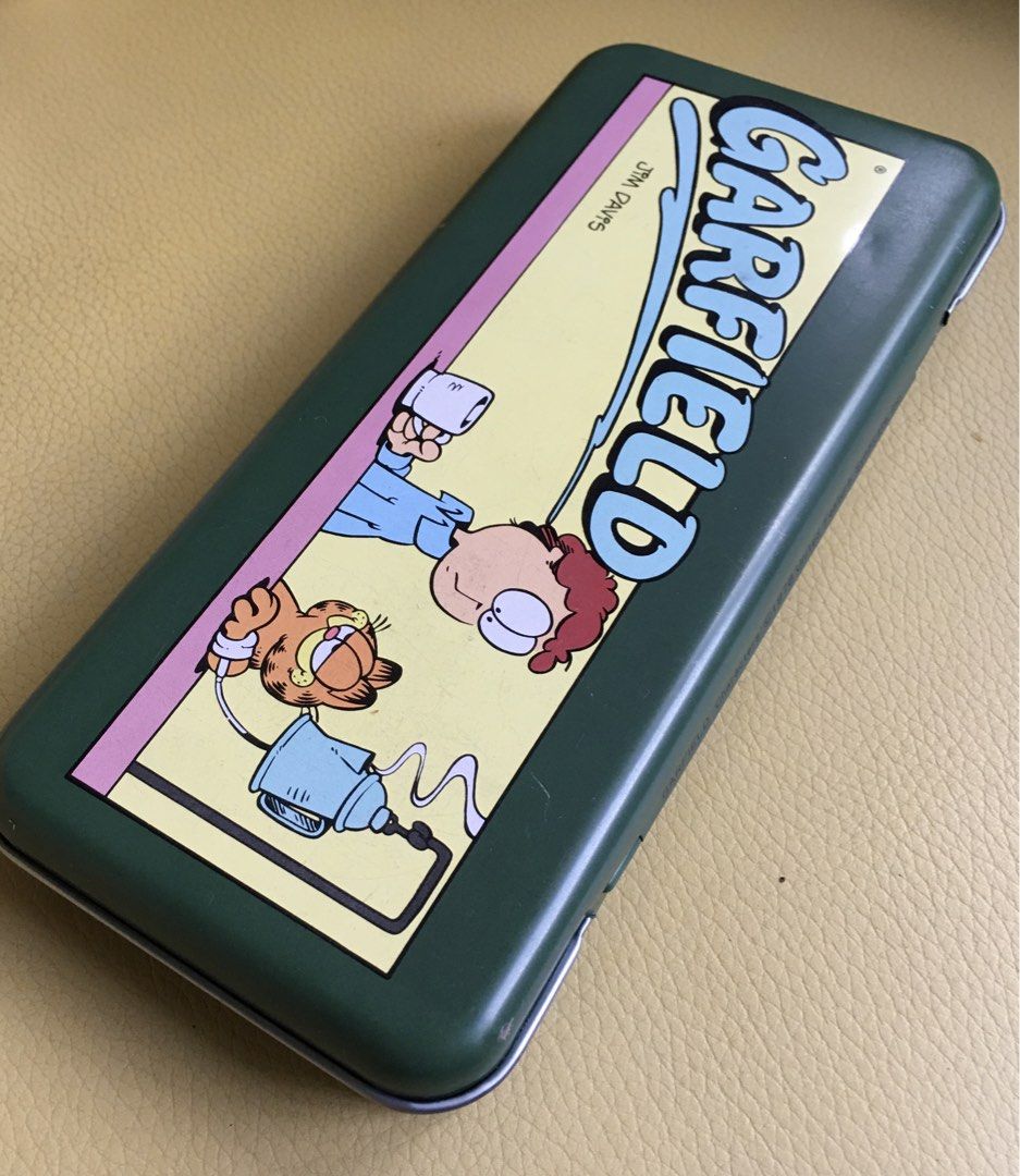 Garfield Metal Tin Pencil Case (Category: Looking For) located in Tarlac. Submitted by greatfindstrlc (Listing ID 1467426065, Image 2). Description: On print the copyright notice “Garfield” 1978 United Features Syndicate, Inc. Good well preserved condition…for an early 73’ barcode era..