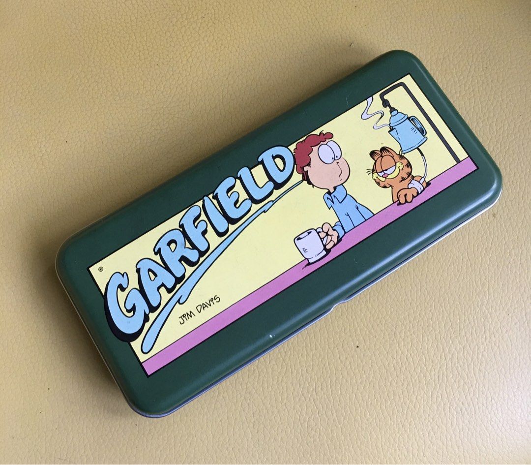 Garfield Metal Tin Pencil Case (Category: Looking For) located in Tarlac. Submitted by greatfindstrlc (Listing ID 1467426065, Image 1). Description: On print the copyright notice “Garfield” 1978 United Features Syndicate, Inc. Good well preserved condition…for an early 73’ barcode era..