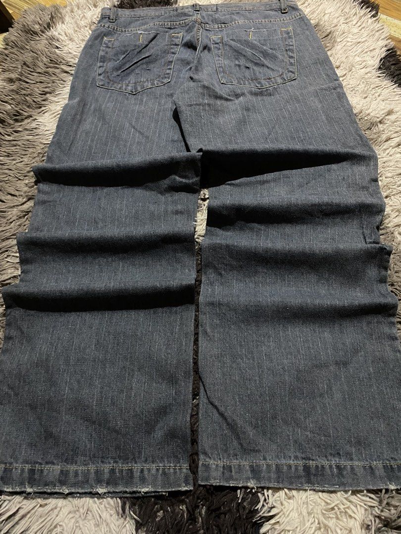 Gear Seven Collection Dark Denim Jeans (Category: Jeans) located in Manila. Submitted by coollion.19b40f (Listing ID 1467542825, Image 2). Description: - Brand: Gear Seven Collection - Wash: Dark wash denim with subtle vertical striping - Fit: Relaxed straight leg with frayed hems - Details: Distressed whiskering, front rip detail, and sturdy branded metal button - Pockets: Two back pockets with diagonal stitching - Condition: Excellent / Pre-lov