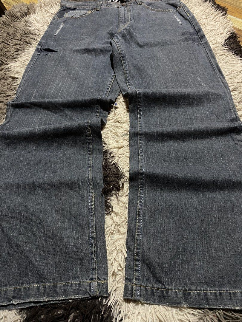 Gear Seven Collection Dark Denim Jeans (Category: Jeans) located in Manila. Submitted by coollion.19b40f (Listing ID 1467542825, Image 1). Description: - Brand: Gear Seven Collection - Wash: Dark wash denim with subtle vertical striping - Fit: Relaxed straight leg with frayed hems - Details: Distressed whiskering, front rip detail, and sturdy branded metal button - Pockets: Two back pockets with diagonal stitching - Condition: Excellent / Pre-lov