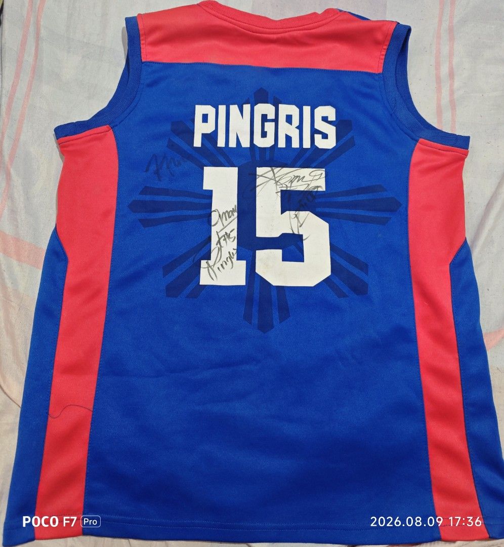 Gilas Pilipinas Marc Pingris Signed Jersey Size 15 (Category: Activewear) located in Manila. Submitted by ross.jeremy (Listing ID 1467599079, Image 2). Description: - Gilas Pilipinas Home Jersey (Marc Pingris #15) - Color: Blue with red side panels and Philippine sunburst design on the back - Authentic details: Nike swoosh, FIBA Asia patch, and Smart sponsor logo - Rare collector's piece: Multi-signed by players across the front and back - Condit