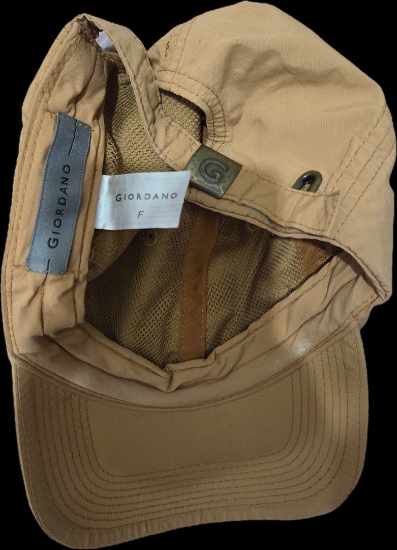 Giordano Brown Khaki Cap Baseball Hat Free Size (Category: Caps & Hats) located in Paranaque City. Submitted by padfootblack (Listing ID 1467477043, Image 2). Description: - Brand: Giordano - Color: Khaki / Neutral Beige Brown - Size: Free size (adjustable strap with 'G' logo metal hardware) - Details: Interior mesh lining, classic curved brim with stitched detailing, original brand labels inside - Condition: Excellent, well-maintained everyday h