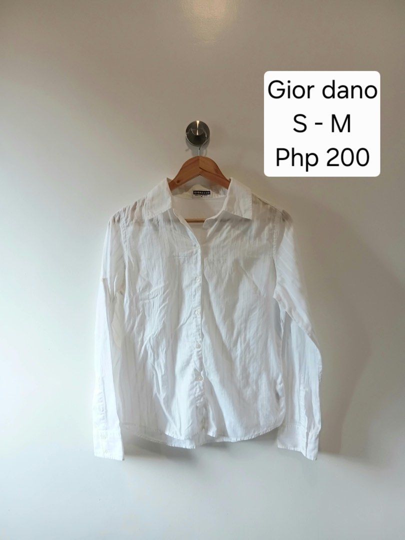 Giordano White Striped Long Sleeve Button-Down Shirt (Category: Formal Shirts) located in Antipolo. Submitted by wisecat.4a7eea (Listing ID 1467402836, Image 1). Description: - Brand: Giordano - Color: Classic white with faint vertical pinstripes - Size: Medium tag (fits like Small to Medium) - Details: Long sleeves with button cuffs, traditional collar neckline - Material: Lightweight and comfortable - Condition: Clean overall, ready to wear.