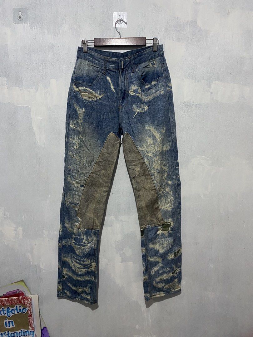 Givenchy by Matthew M. Williams Moleskin Distressed Jeans (Category: Jeans) located in Bulacan. Submitted by _myarchive (Listing ID 1467421672, Image 1). Description: - Brand: Givenchy - Fit: Straight fit - Color: Blue with unique washed texture - Material: 100% cotton, Made in Japan - Details: Heavy all-over distressing, front knee panel details, branded hardware button fly - Condition/Labels: Size tag and brand labels clearly visible inside - P