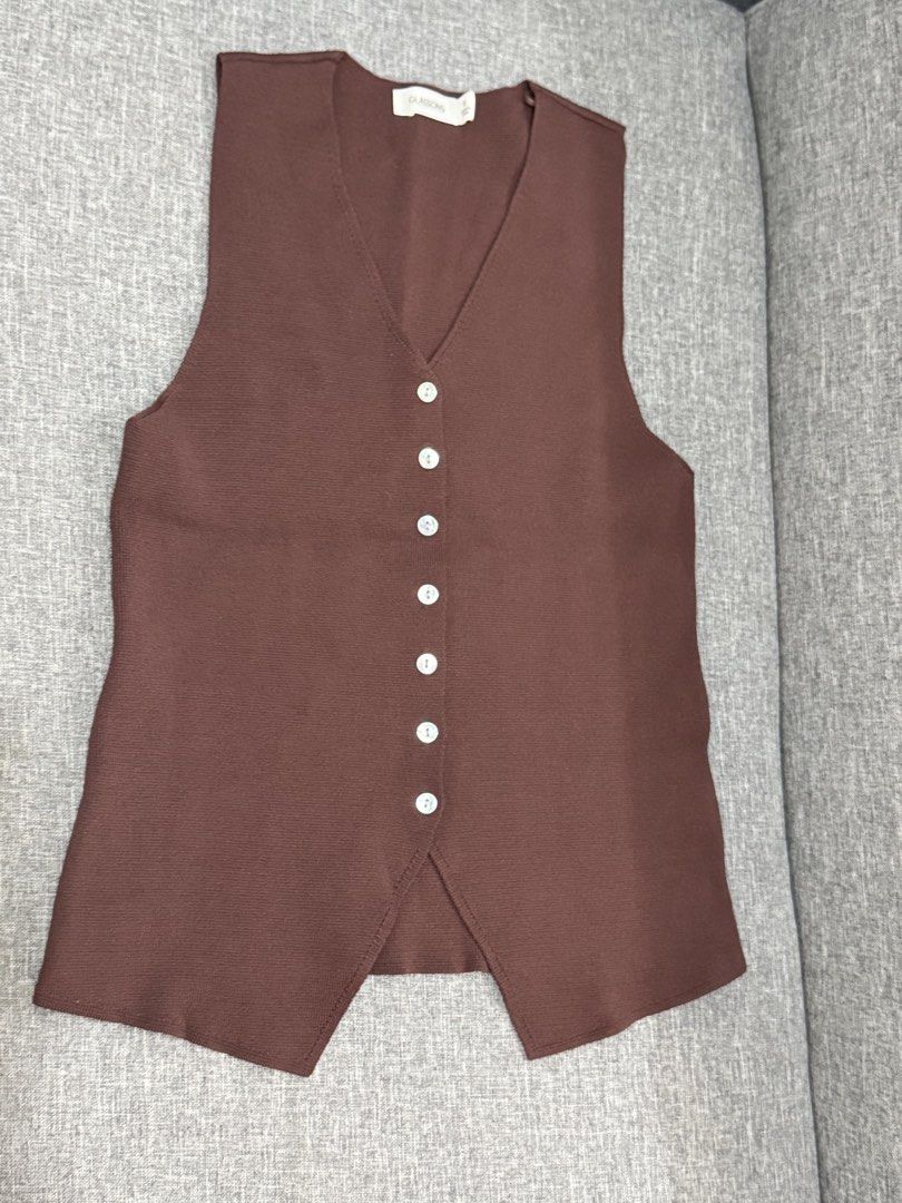 Glassons Brown Button Up Knit Vest Size S (Category: Sleeveless) located in Taguig. Submitted by amaemags (Listing ID 1467510245, Image 1). Description: - Knit vest with V-neckline and button-down front - Color: Chocolate Brown.