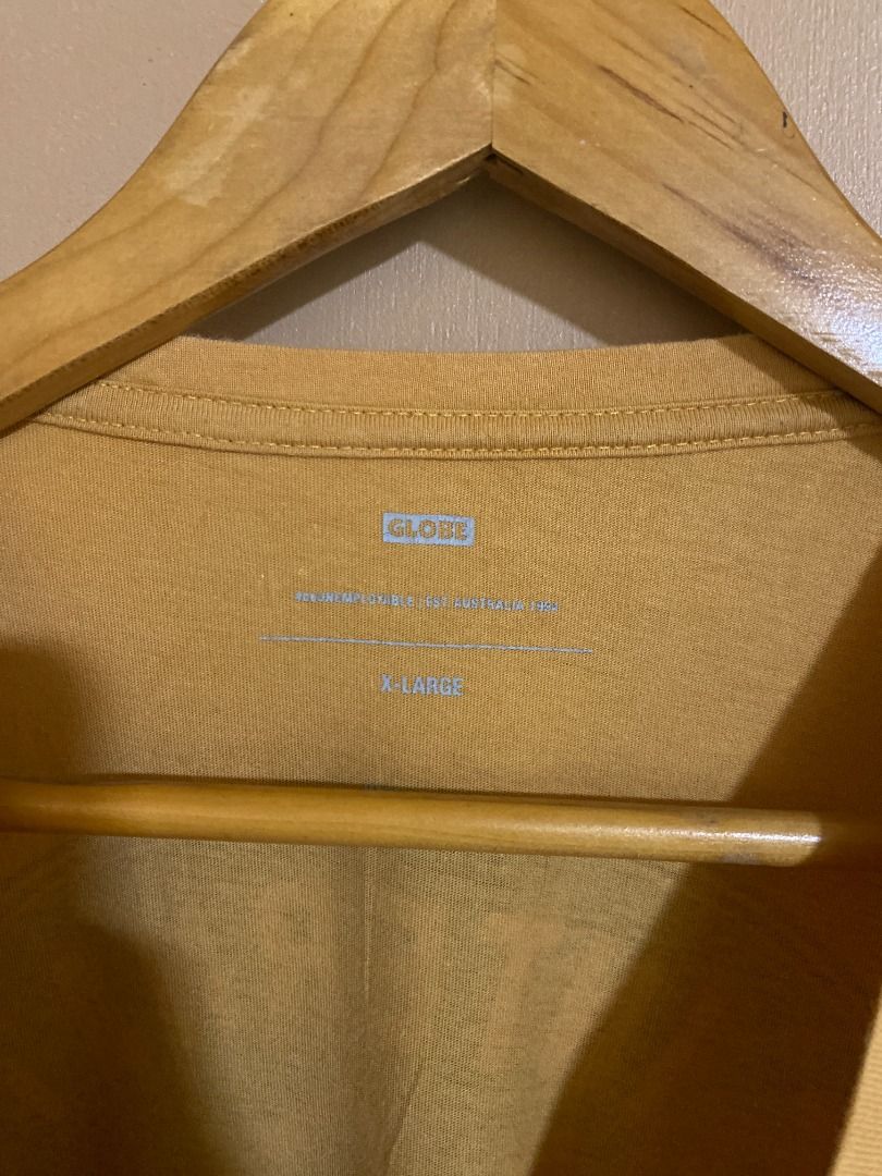 Globe Skateboards Mustard Mullet Type Shirt (Category: Tshirts & Polo Shirts ) located in Cadiz. Submitted by thespotcdz (Listing ID 1467396620, Image 3). Description: XL on tag Width 21.5" Length 33" Excellent condition.