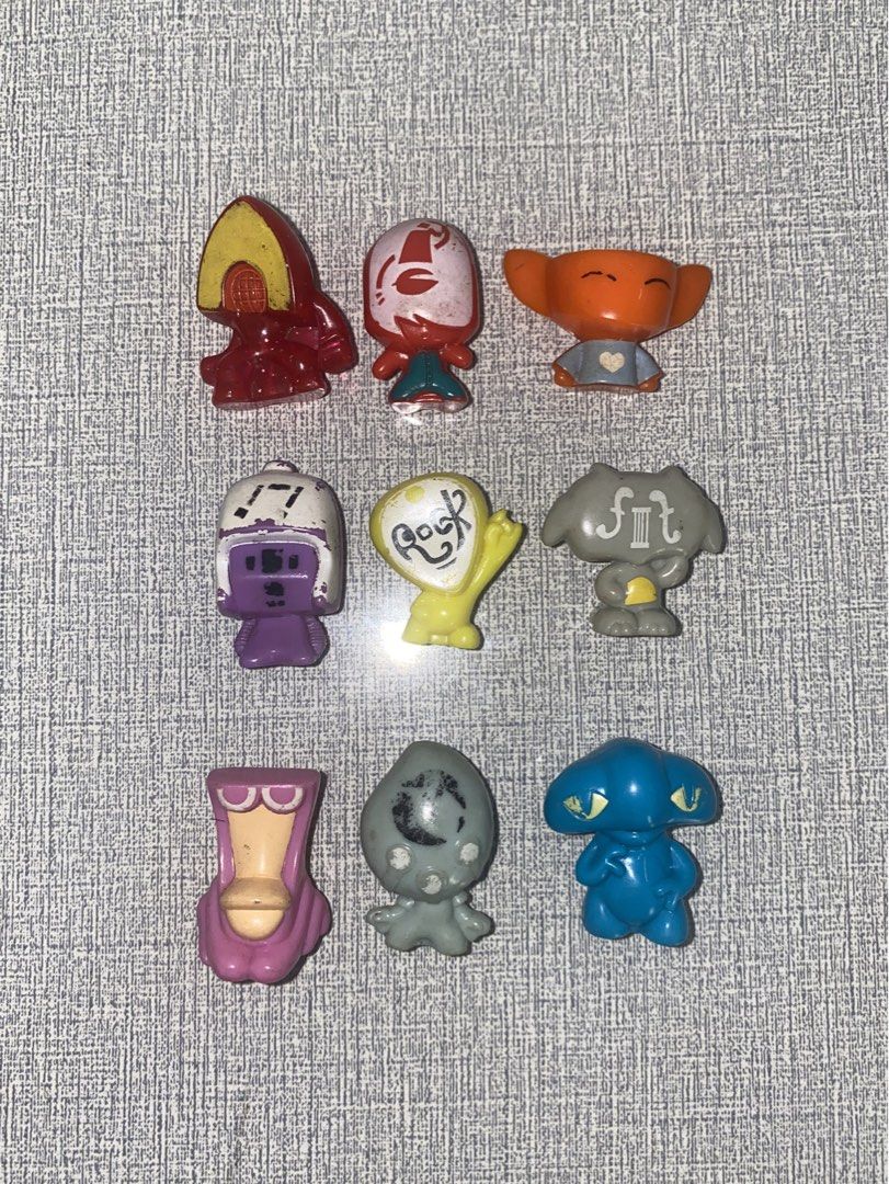 Gogo's Crazy Bones Bundle (Category: Designer & Blind Box Toys) located in San Mateo. Submitted by brattyboi (Listing ID 1467389057, Image 1). Description: - Set of 9 small collectible mini figures in various shapes and colors - Features unique designs, prints, and painted details - Some figures show minor surface wear and markings - Perfect addition for shelf displays, collectors, and nostalgia fans - Sold as a complete bundle.