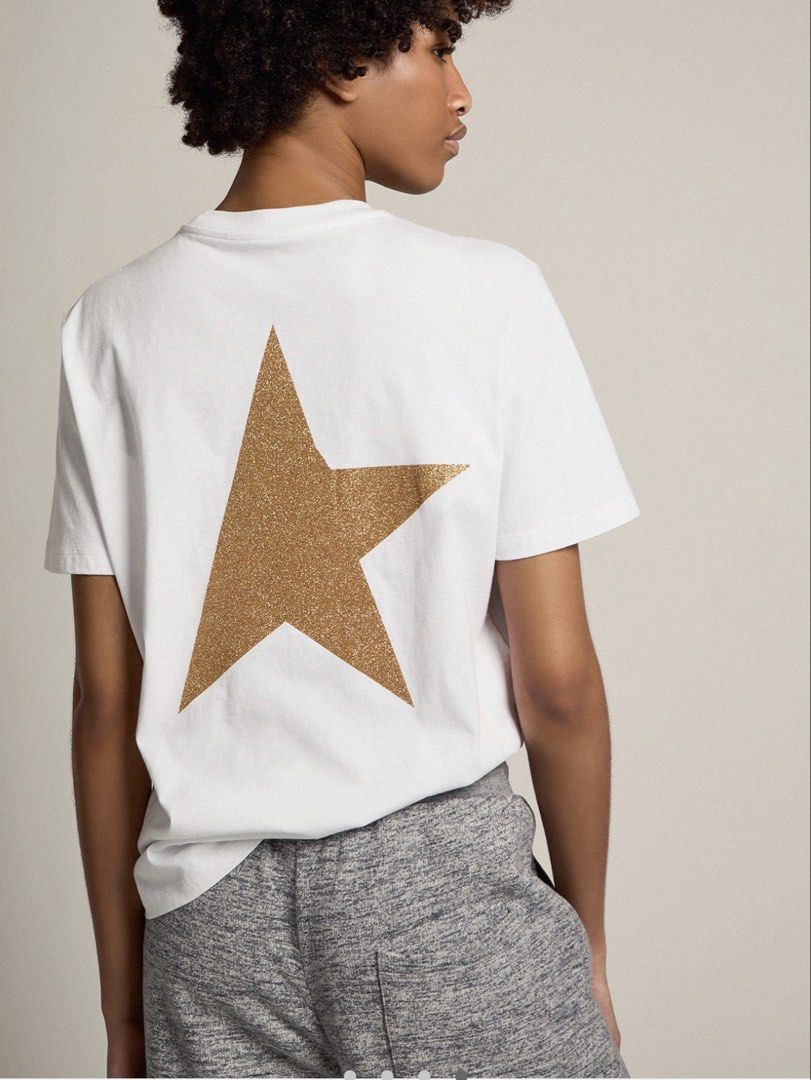 Golden Goose Star Tee (Category: Shirts) located in Cavite. Submitted by sc_rcity (Listing ID 1467484948, Image 2). Description: Tagged Size : Small Women’s Authentic ( Scannable NFC ) Made in Italy Flaw : Slight detached glitter print on back print. Barely noticeable. No Inclusion Note : please manage your expectation since this is a white tee. Measurements: in inches ( approx. ) Width 20 Length 27 Shoulder 17 Sleeve 8.5.