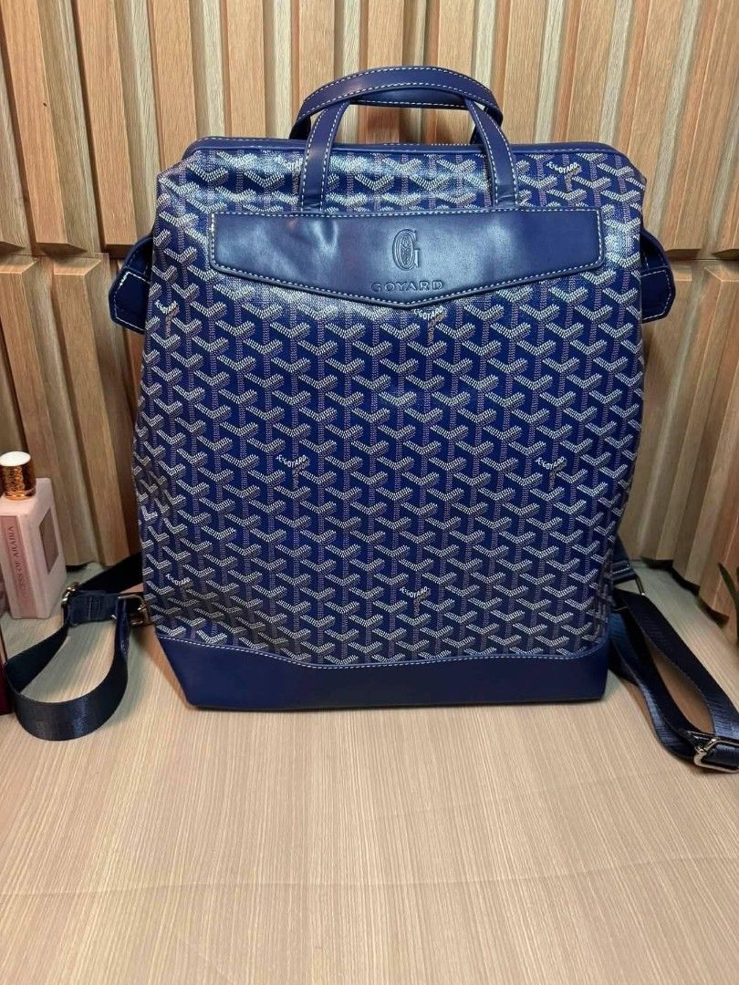 Goyard Blue Monogram Backpack with Yellow Interior (Category: Backpacks) located in Manila. Submitted by goodbuying_items0211 (Listing ID 1467404463, Image 1). Description: - Style: Blue monogram backpack with stylish white stitching - Material & Accents: Solid blue leather trim, top handle, and durable metal hardware - Straps: Adjustable dark shoulder straps for a comfortable fit - Closure: Secure top zipper closure - Interior: Vibrant yellow fa