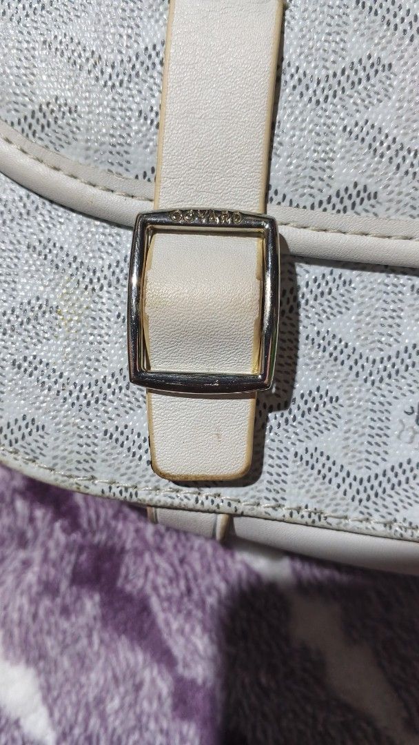 Goyard White Monogram Crossbody Shoulder Bag (Category: Luxury Bags & Wallets) located in Manila. Submitted by thriftnijuls (Listing ID 1467481966, Image 2). Description: - Brand: Goyard - Style: Crossbody bag - Color: White with signature chevron canvas pattern and leather trim - Hardware: Gold-tone - Closure: Double buckle flap - Interior: Yellow lining with stamped Goyard Paris Made in France logo - Details: Adjustable shoulder strap with stam