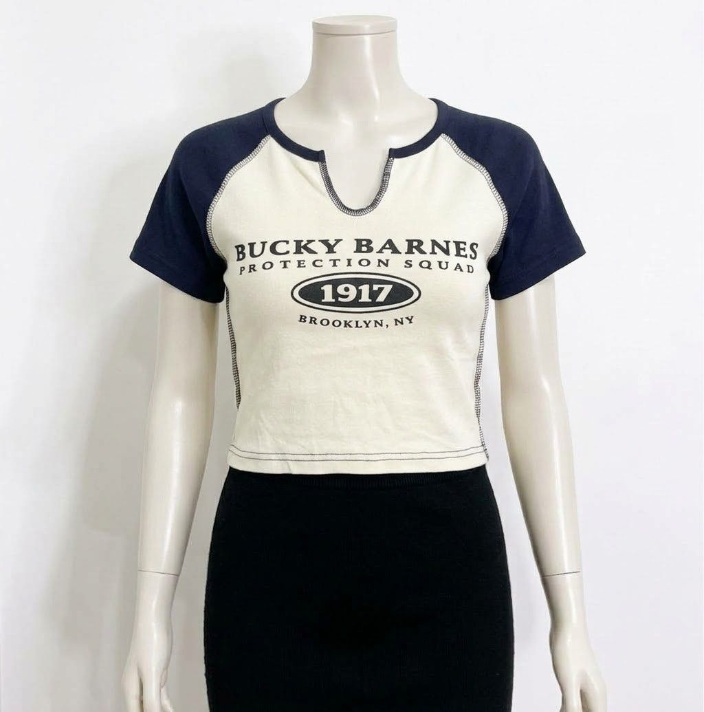 Grande "Bucky Barnes Protection Squad" Raglan Crop Top (Category: Others Tops) located in Calapan. Submitted by shop_storeal (Listing ID 1467413220, Image 2). Description: Brand: GRANDE (Made in Korea) Size: Fits Small to Semi-Medium (Crop fit) Condition: Excellent Preloved Condition Width: 15 in Length: 15 in MOP: Gcash, GoTyme MOD: J&T.