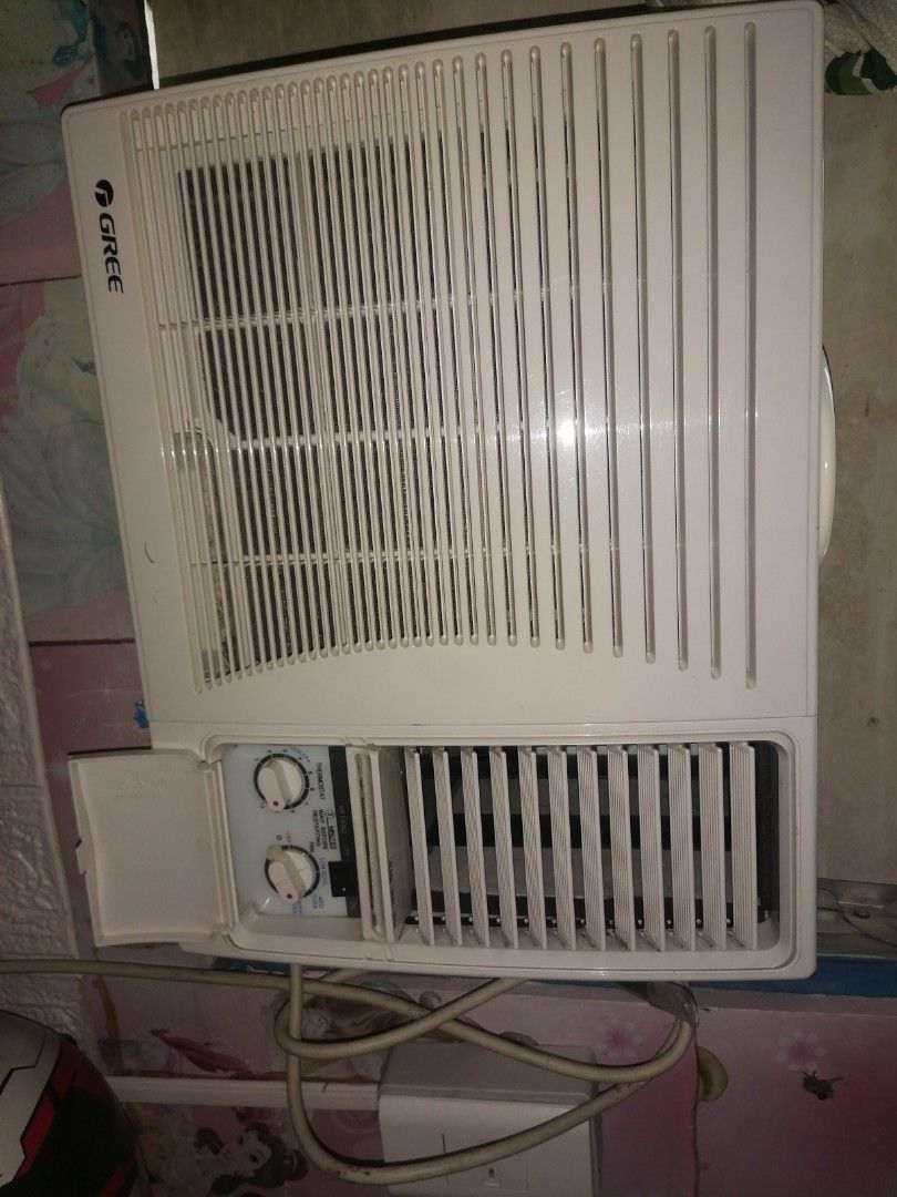 GREE Window Type Air Conditioner (Category: Air Conditioning and Heating) located in Manila. Submitted by yzekielss27217 (Listing ID 1467370421, Image 3). Description: - Brand: GREE Window Air Conditioner - Color: Clean white finish - Controls: Dual rotary knobs for easy thermostat and fan speed adjustment - Airflow: Adjustable louvers for horizontal and vertical direction - Performance: Cools rooms quickly and effectively - Setup: Standard windo