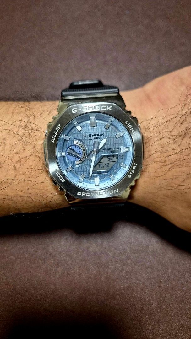 G-SHOCK GBM-2100A-1A2 "CasiOak" with Solar & Bluetooth (Category: Men's Watches) located in Quezon City. Submitted by themarvin_69 (Listing ID 1467509733, Image 1). Description: G-SHOCK GBM-2100A-1A2 "CasiOak" with Solar & Bluetooth Php11,499 Condition: 9/10 Selling this stunning Casio G-Shock GBM-2100A-1A2 from the G-Steel series. It features a premium polished metal octagonal bezel paired with an eye-catching light blue metallic textured dial. 