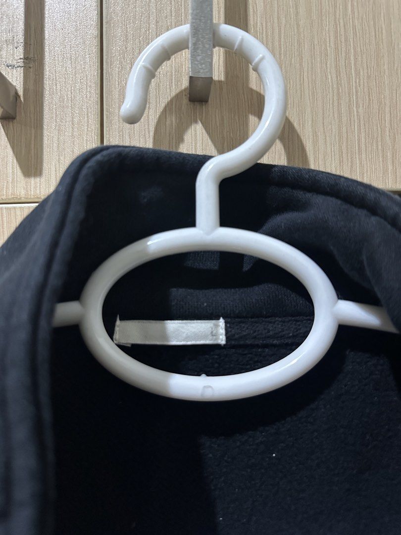 GU Black Quarter-Zip Sweatshirt Size L (Category: Coats, Jackets and Outerwear) located in Mandaluyong City. Submitted by _s3ll3r (Listing ID 1467455791, Image 2). Description: - Color: Solid Black - Size: Large (L) - Material: Soft fleece interior for maximum warmth - Details: Silver metal zipper at the collar - Features: Convenient side pockets, plus ribbed cuffs and hem - Condition: Excellent/Ready to wear.