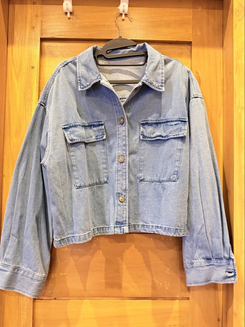 GU Denim Cropped Shirt Jacket Blue (Category: Coats, Jackets and Outerwear) located in Bacoor. Submitted by caramelcart (Listing ID 1467497801, Image 2). Description: - Brand: GU - Item: Denim cropped shirt jacket - Color: Blue - Product Number: 339951 - Fit: Relaxed fit - Details: Long sleeves, button-down front, dual chest flap pockets - Style: Great layering piece for casual outfits.