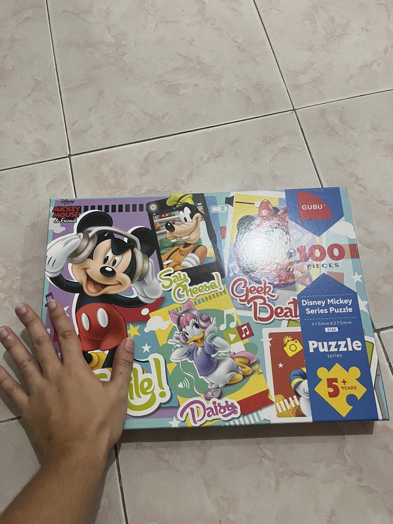 Gubu Disney 100pcs puzzle (Category: Educational & Learning Toys) located in Bay. Submitted by benta_mama (Listing ID 1467378707, Image 2). Description: LO played once, then di na nilaro 🤣 Complete pieces. Can pass as brand new .
