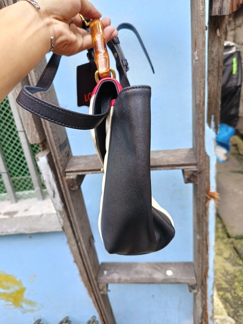 Gucci bamboo (Category: Shoulder Bags) located in Manila. Submitted by alwaysgoodzthrift (Listing ID 1467417272, Image 3). Description: Gucci two way bamboo details posted no major flaws.