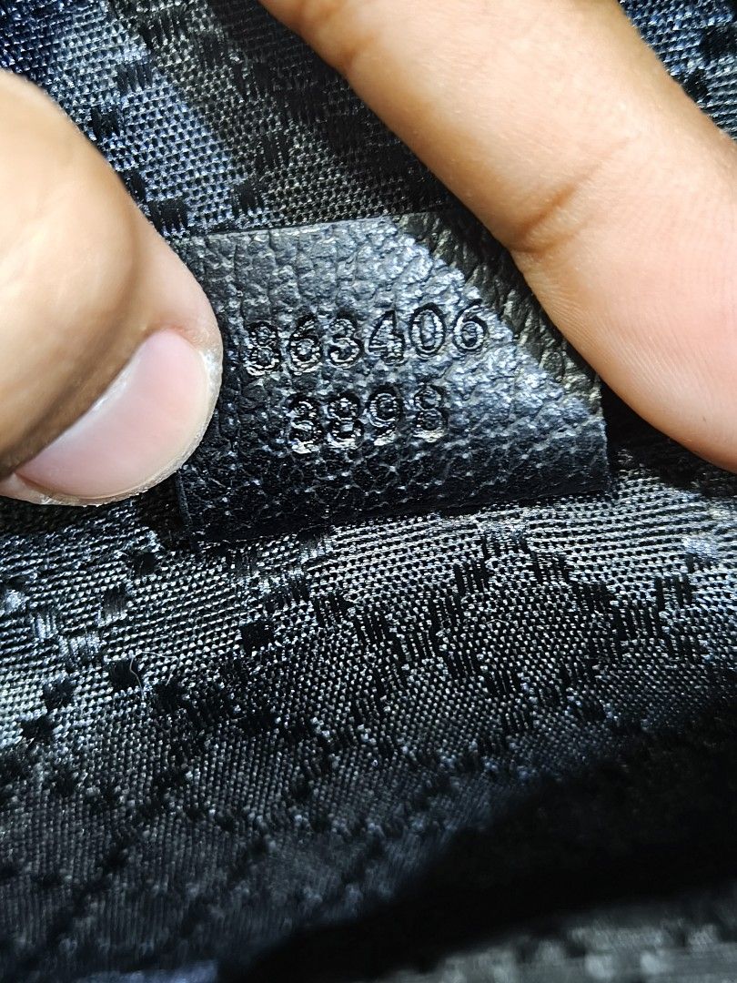 Gucci Black GG Monogram Web Stripe Shoulder Bag (Category: Luxury Bags & Wallets) located in Davao. Submitted by navil01 (Listing ID 1467488242, Image 3). Description: - Gucci shoulder bag featuring the iconic black GG monogram canvas - Classic green and red web stripe down the center - Durable black leather strap and trim with sleek silver-tone hardware - Secure top zipper closure to keep your essentials safe - Clean black fabric interior lining