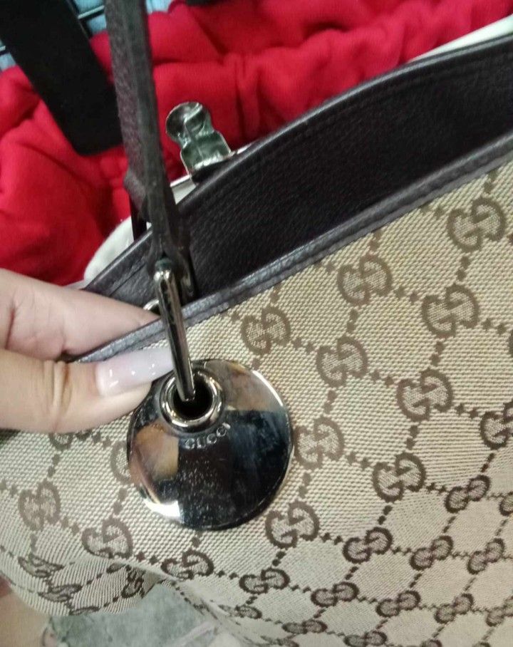 GUCCI TOTE (Category: Luxury Bags & Wallets) located in Bontoc. Submitted by athena_zia (Listing ID 1467396151, Image 3). Description: 🤎 GUCCI GG MONOGRAM TOTE BAG 🤎 Classic Gucci style featuring the iconic GG monogram canvas, brown leather trim, and elegant shoulder handles. A timeless piece perfect for everyday use! 👜 📌 Pre-loved item 📌 Condition: Excellent condition 📌Large in size can fit everything ☺️ We do shipping nationwide via JNt p