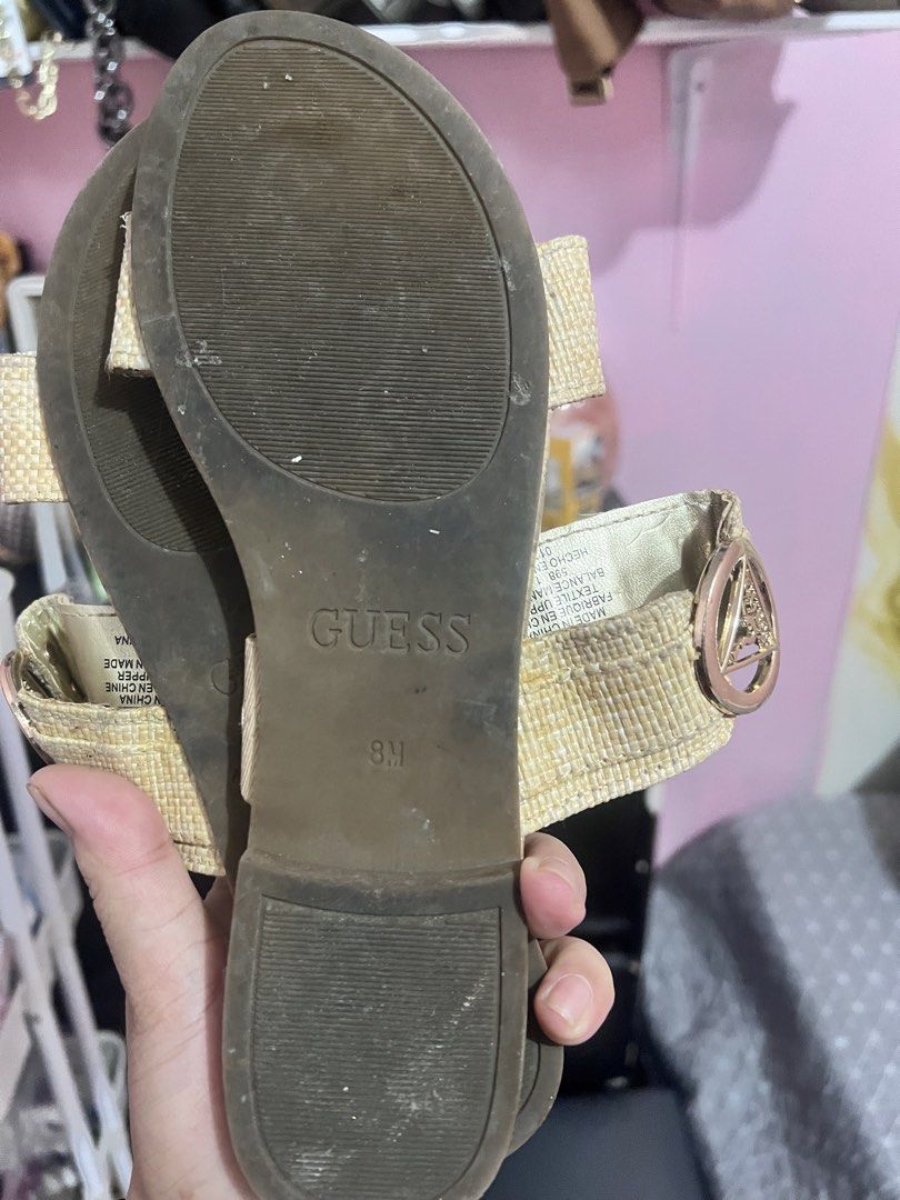 Guess Cork Print Slide Sandals Size 8M (Category: Flats & Sandals) located in Manila. Submitted by cleverstone_21f597 (Listing ID 1467487839, Image 3). Description: - Brand: Guess - Style: Flat slip-on sandals with cork print and woven beige straps - Details: Gold metallic accents and side buckle hardware - Size: 8M - Condition: Worn a few times, light scuffs on bottom treads - Perfect for warm weather and everyday wear!.