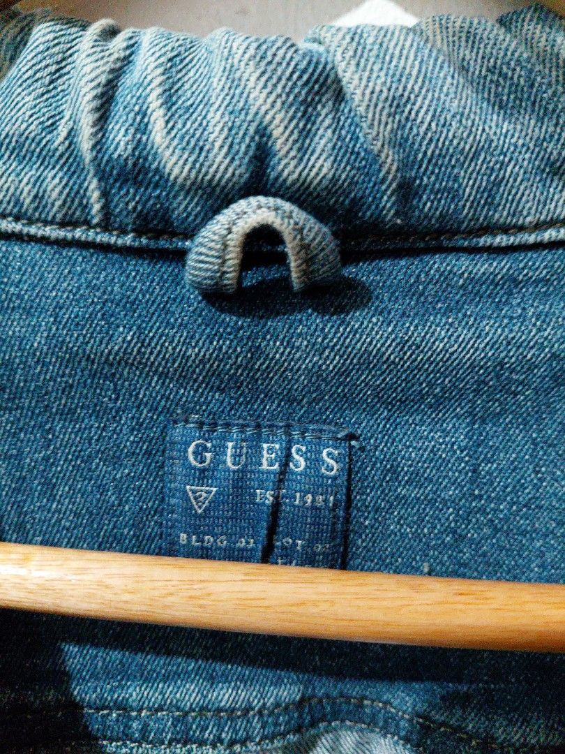 Guess Denim Jacket (Category: Coats, Jackets and Outerwear) located in Tarlac. Submitted by wornwardrobe (Listing ID 1467476372, Image 2). Description: Kindly note that all items are stored at my parents' house and not on hand. Retrieval takes up to 2 weeks before shipping. Please purchase only if you're okay with the wait. Message me to check the next available shipping date! Thank you!.