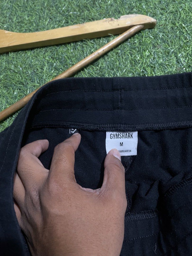 Gymshark Black Shorts Size M (Category: Shorts) located in Las Pinas. Submitted by jynxdefant26140 (Listing ID 1467519751, Image 2). Description: - Brand: Gymshark - Color: Black - Size: Medium - Condition: Great / Like new - Features: Adjustable drawstring waistband, convenient side pockets, and embroidered logo on left leg - Material: Soft, comfortable fabric ideal for workouts or chilling at home - Origin: Made in Bangladesh - Ships fast withi