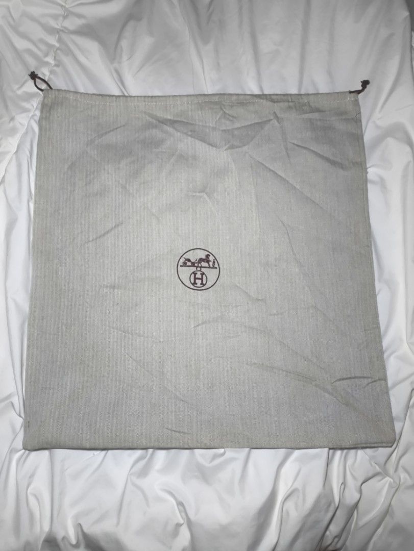 H Large DUSTBAG (Category: Luxury Accessories) located in Manila. Submitted by rewearables.mnl (Listing ID 1467548118, Image 1). Description: FOR SALE -THE H LARGE DUSTBAG DIMENSION: 21.5" X 20" CONDITION:10/10 COLOR RATE:10/10 ISSUE:NEEDS WASH ASKING PRICE:3500 **REWEARABLES PRODUCT DISCLAIMER** All thrift items are pre-loved and may show minor signs of wear or age. Please review photos and descriptions carefully before purchase. We make every e