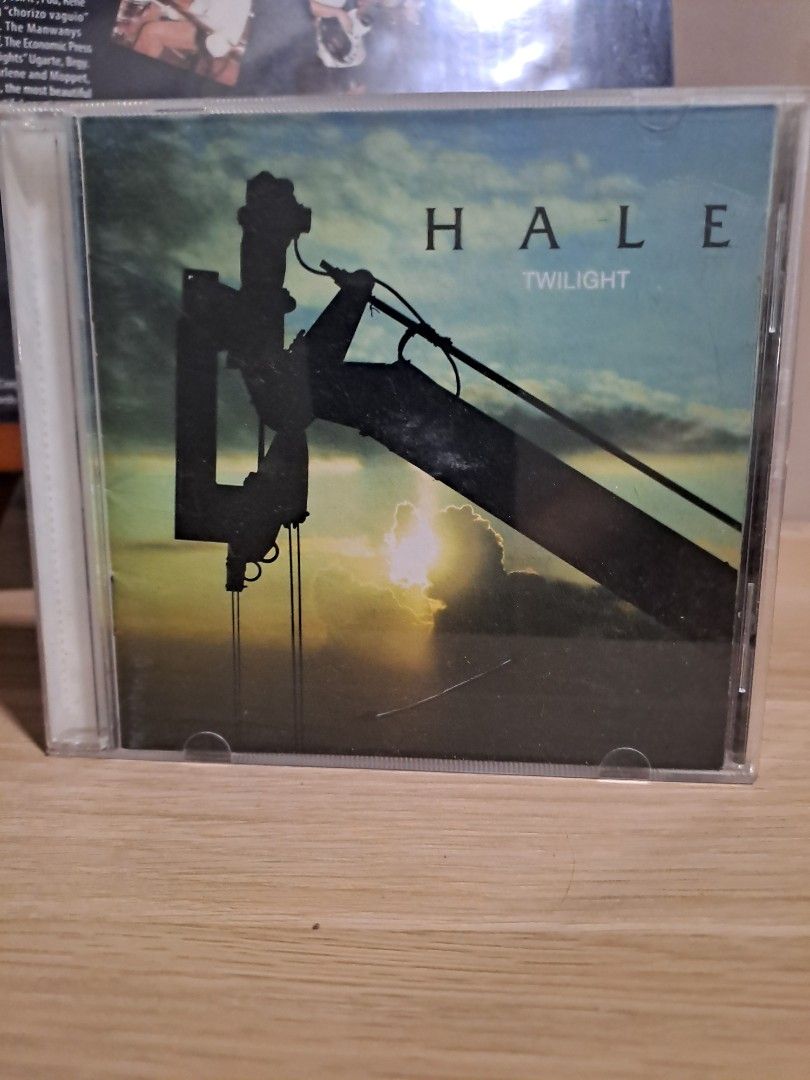Hale Twilight Original Audio CD Album (Category: CDs & DVDs) located in Las Pinas. Submitted by cobieshop (Listing ID 1467506311, Image 1). Description: - Artist/Album: Hale - Twilight - Label: EMI and Pony - Tracklist: Includes 14 tracks (Last Song, Fire in the Sky, The Ballad of Woe, Hide and Seek, Liham, and more) - Condition: Jewel case has minor surface scratches on the front; disc, spine, and back insert are fully intact - Format: Original 