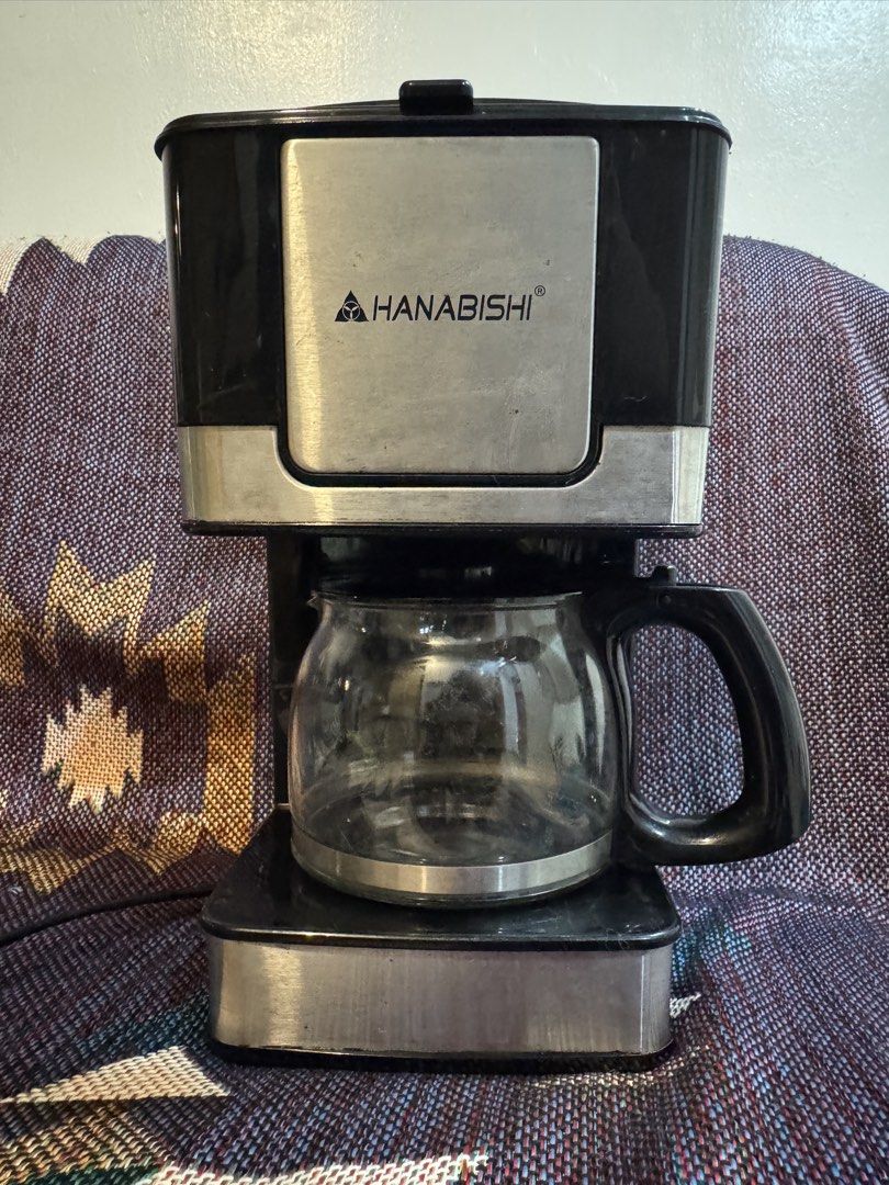 Hanabishi Coffee Maker (Category: Coffee Machines & Makers) located in Bulacan. Submitted by chihiro20 (Listing ID 1467407896, Image 2). Description: Enjoy freshly brewed coffee at home with this Hanabishi drip coffee maker! Perfect for everyday coffee lovers who want a simple and convenient way to make their favorite coffee. 🖤 ✅ Easy to use ✅ Glass coffee carafe ✅ Great for home or office use ✅ Perfect for your daily coffee fix 💰 Price: ₱800 n
