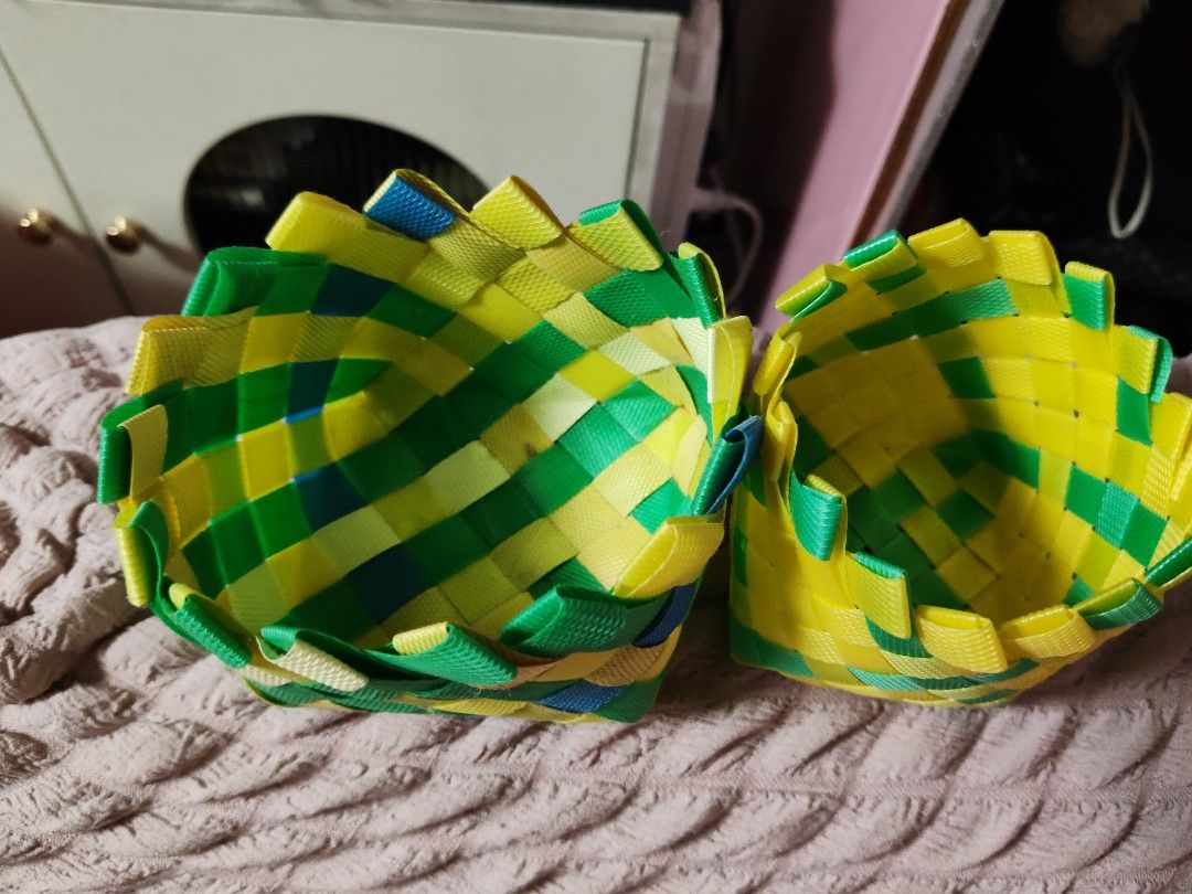 Handmade Woven Plastic Storage Baskets Yellow Green Blue (Category: Storage Boxes & Baskets) located in Pasay City. Submitted by ynamariie (Listing ID 1467467960, Image 3). Description: - Handmade woven baskets made from durable, lightweight plastic straps - Vibrant yellow, green, and blue geometric pattern - Dimensions: approx. 4 to 5 inches across, 3 inches tall - Multi-purpose: ideal for desk supplies, bathroom accessories, and small item orga