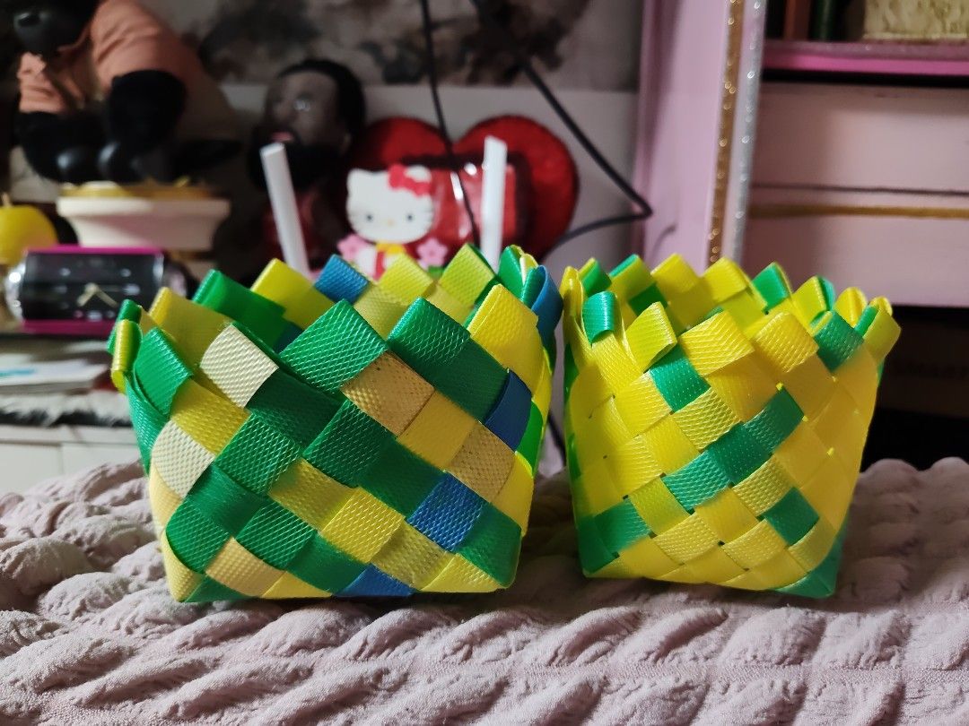 Handmade Woven Plastic Storage Baskets Yellow Green Blue (Category: Storage Boxes & Baskets) located in Pasay City. Submitted by ynamariie (Listing ID 1467467960, Image 2). Description: - Handmade woven baskets made from durable, lightweight plastic straps - Vibrant yellow, green, and blue geometric pattern - Dimensions: approx. 4 to 5 inches across, 3 inches tall - Multi-purpose: ideal for desk supplies, bathroom accessories, and small item orga