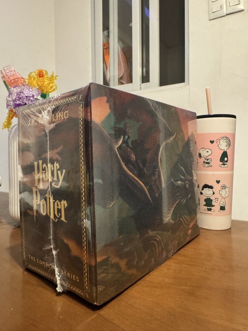 Harry Potter The Complete Series Box Set J.K. Rowling (Category: Storybooks) located in Manila. Submitted by chantyyy0325 (Listing ID 1467406590, Image 3). Description: - Complete Harry Potter book series (Sorcerer's Stone to Deathly Hallows) - Brand new and 100% factory sealed in plastic shrink wrap - Comes with original pictorial slipcase featuring dragon spine artwork - Untouched and unopened, pristine condition - Perfect gift for Potterheads 