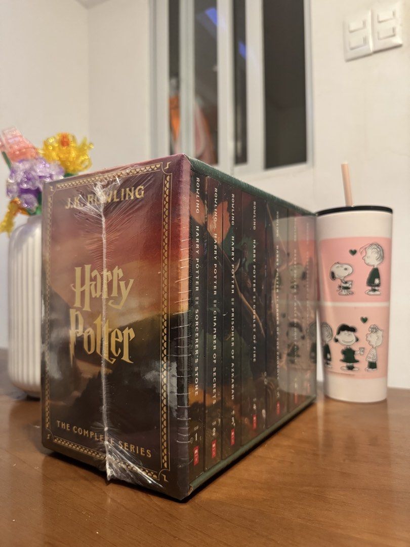 Harry Potter The Complete Series Box Set J.K. Rowling (Category: Storybooks) located in Manila. Submitted by chantyyy0325 (Listing ID 1467406590, Image 1). Description: - Complete Harry Potter book series (Sorcerer's Stone to Deathly Hallows) - Brand new and 100% factory sealed in plastic shrink wrap - Comes with original pictorial slipcase featuring dragon spine artwork - Untouched and unopened, pristine condition - Perfect gift for Potterheads 